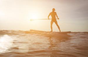 Paddleboarder in the sun